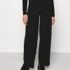 Anna Field BELTED FLARED LEG PANTS - Pantalones - Black, Mujer -Anna Field Moda 3e26cc315cf54dbdaa19f6828f6cffe5